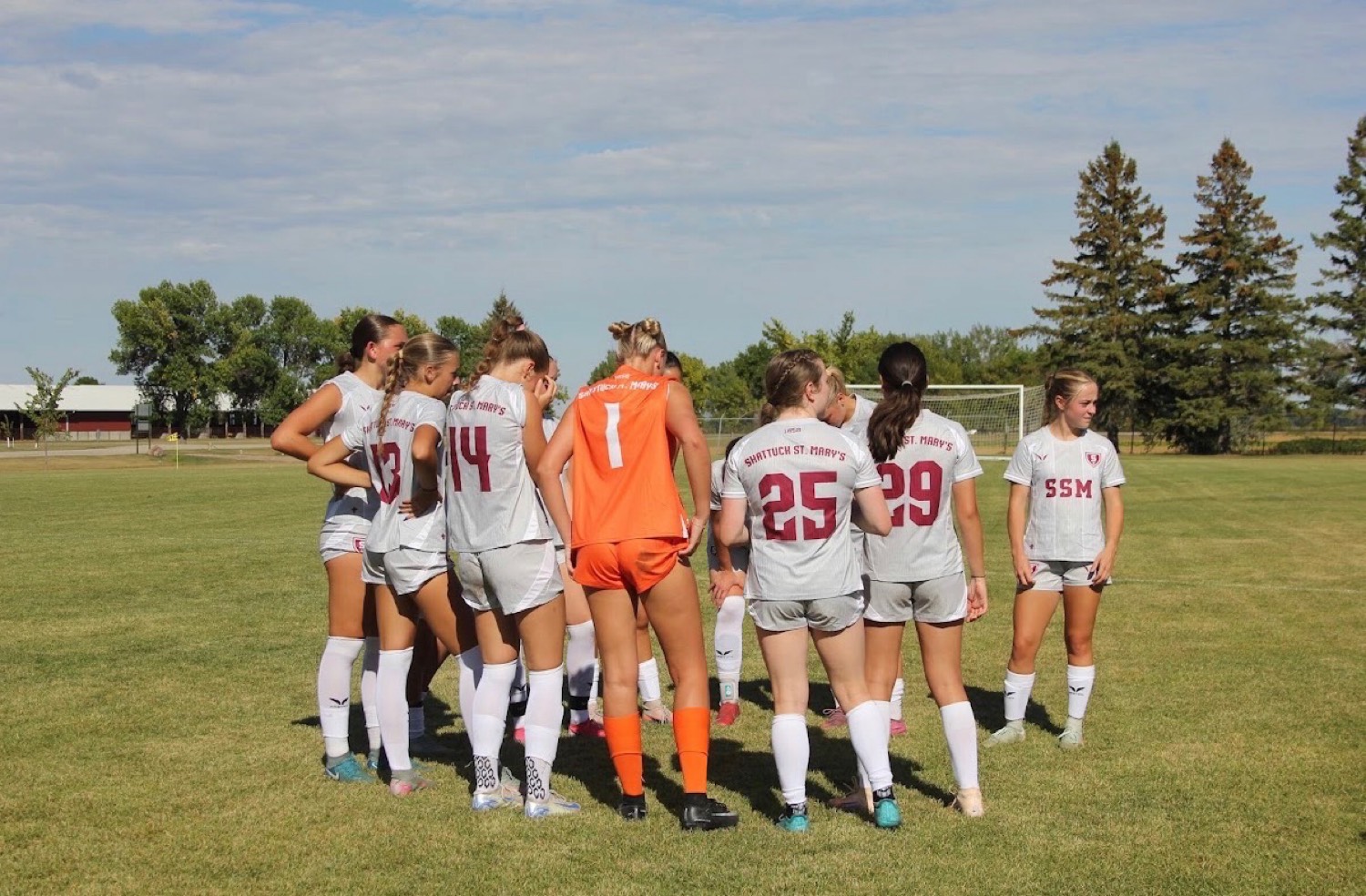 Taylor in the team huddle wearing #1